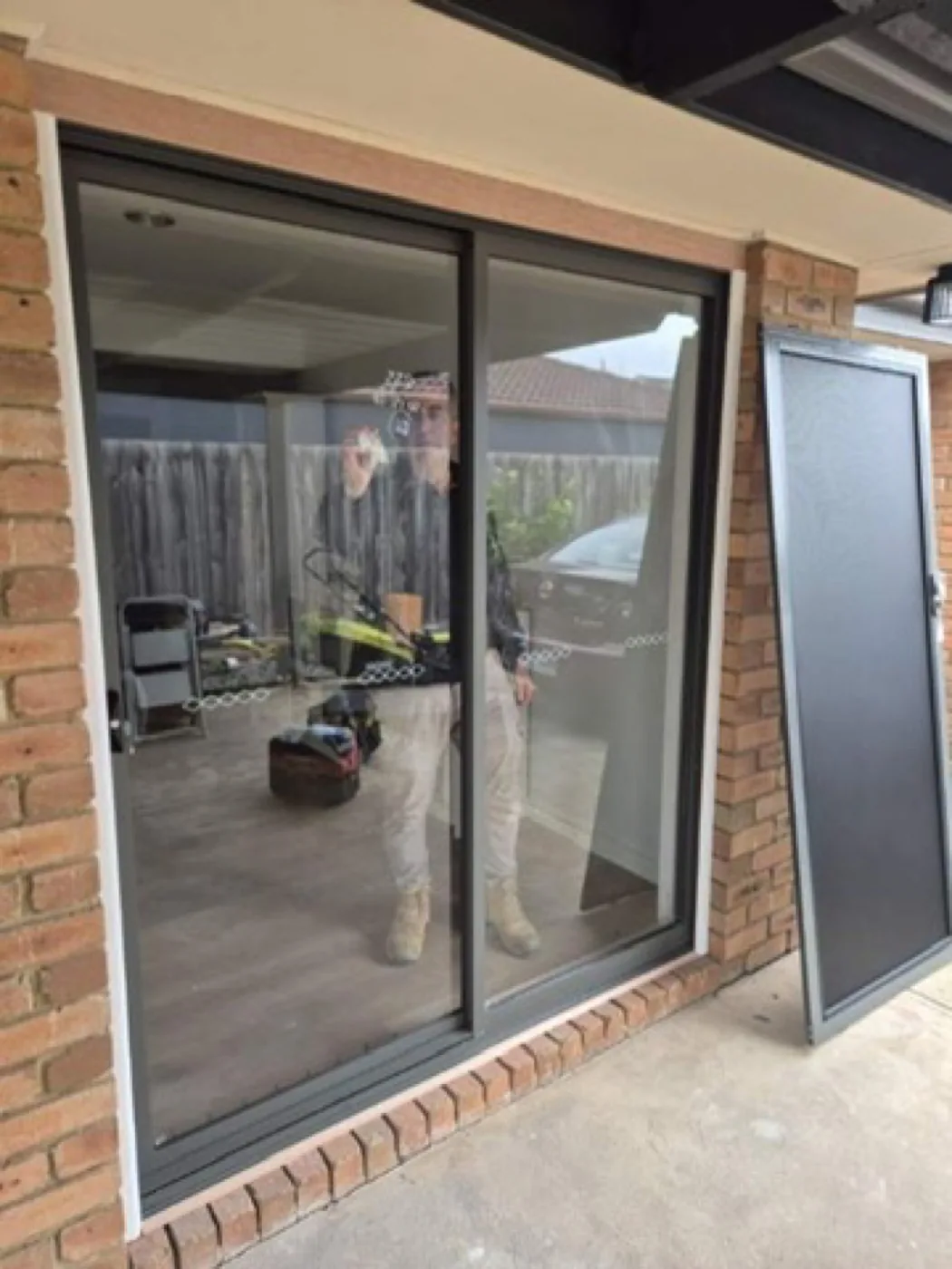New aluminium sliding door installed with security screen ready to fit