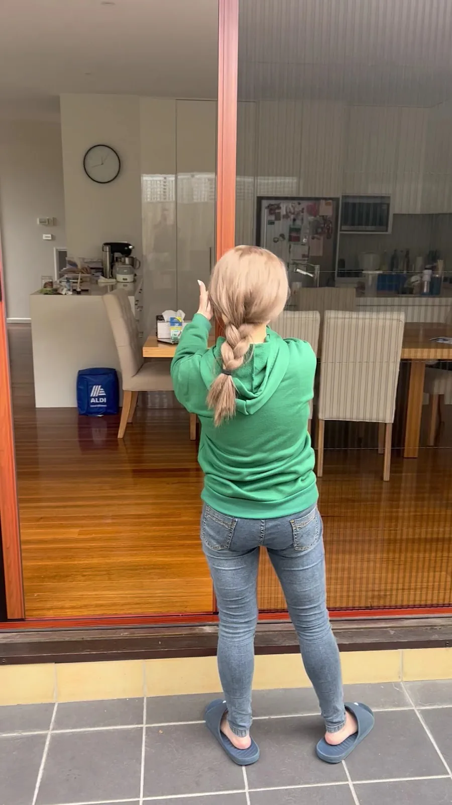 Retractable fly screen fitted to a wide sliding door